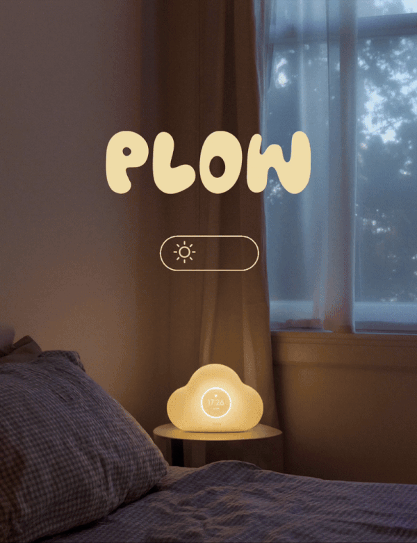 La veilleuse nuage de la marque plow, posé sur une table de nuit dans une chambre, qui change de couleur (jour à la nuit), par Clarisse Joly (rvb challenge)